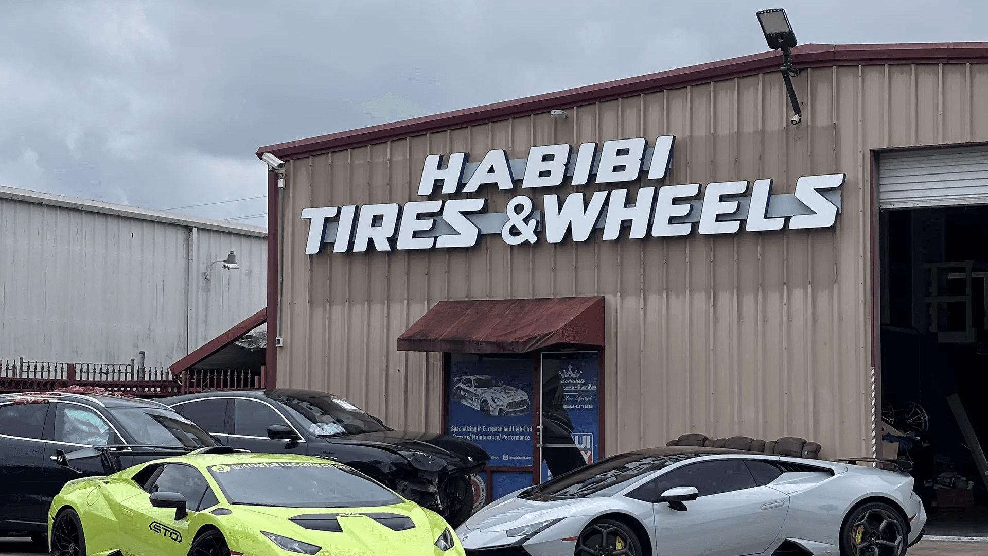 Habibi Tires & Wheels storefront and customer vehicles